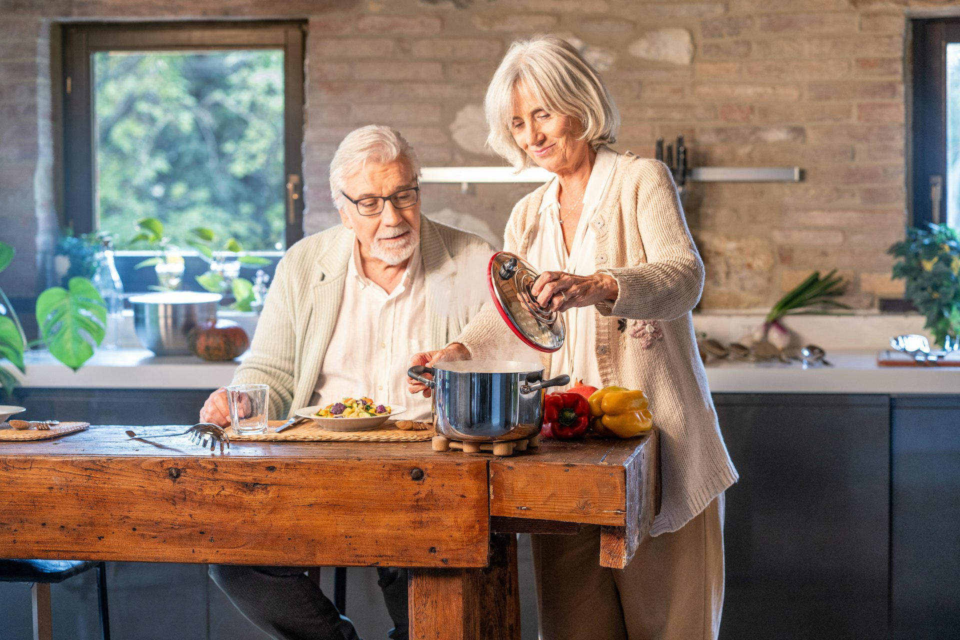 Older adults sharing a meal at home